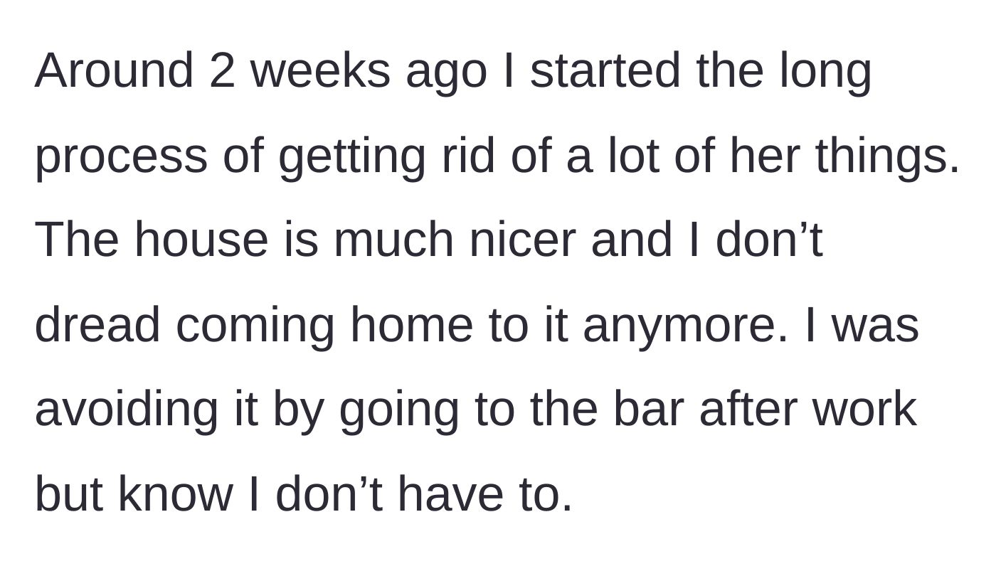 Story part 4 - A person sitting alone at a dimly lit bar, staring into a glass, avoiding the pain of going home.