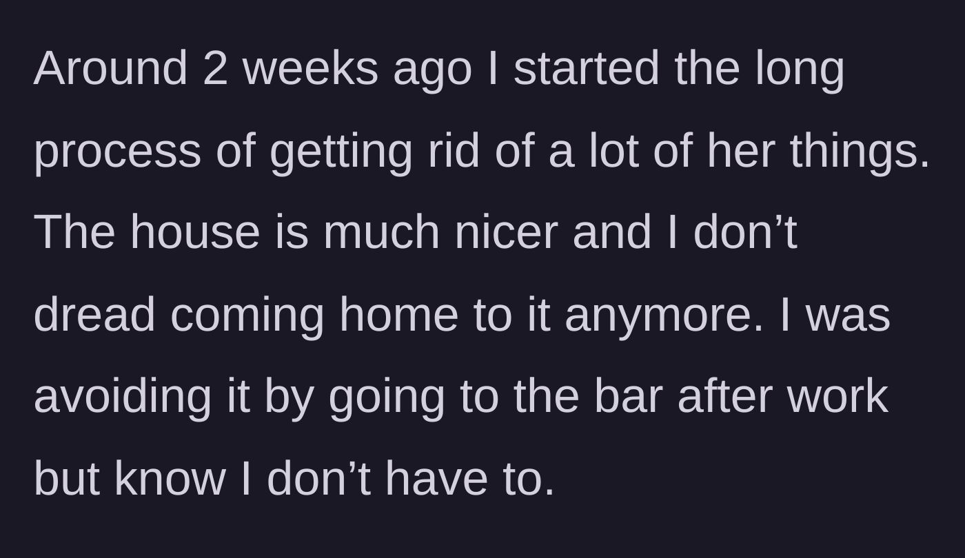 Story part 4 - A person sitting alone at a dimly lit bar, staring into a glass, avoiding the pain of going home.