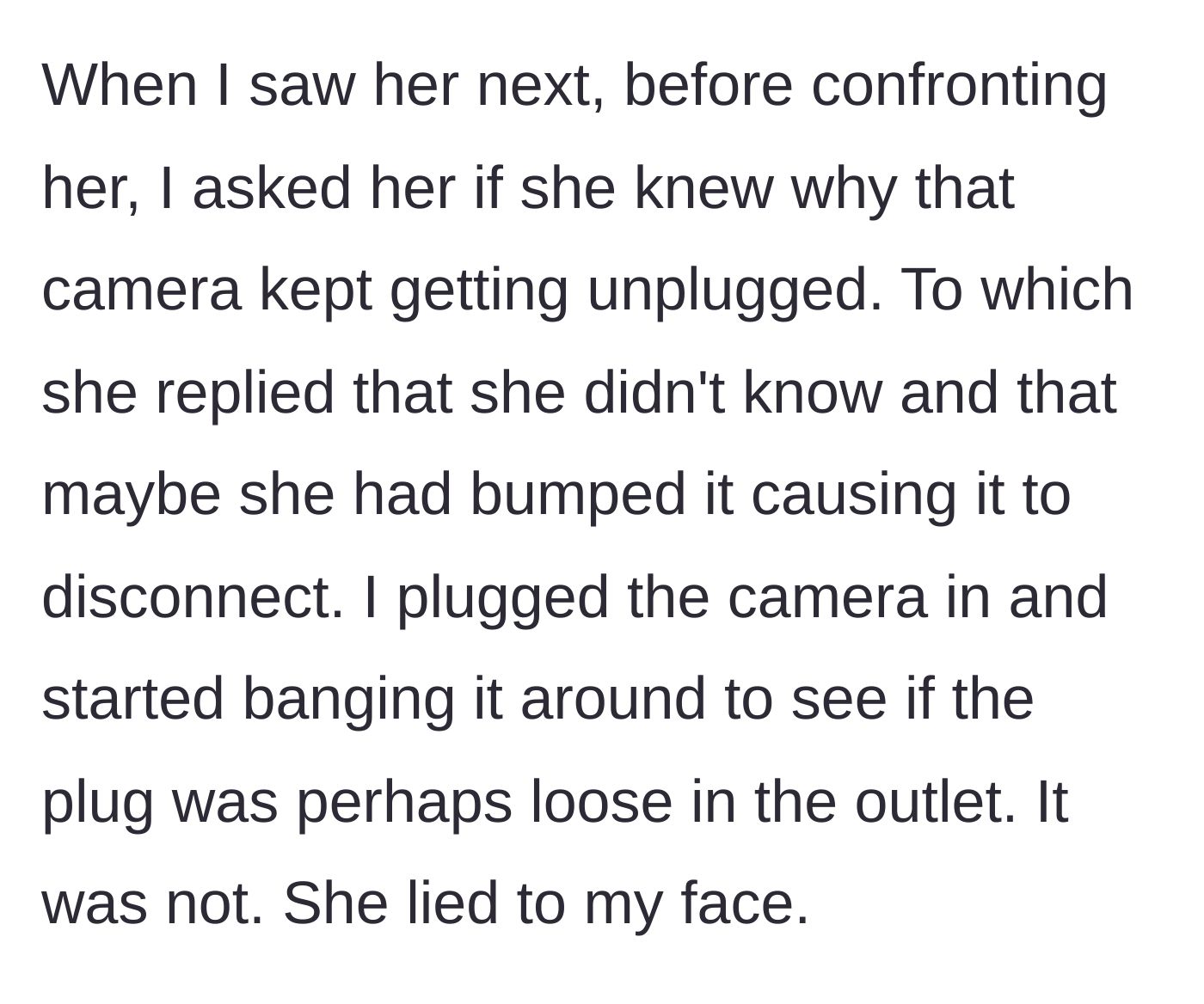 Story part 6 - A woman testing an outlet by shaking a plugged-in camera while her partner watches.