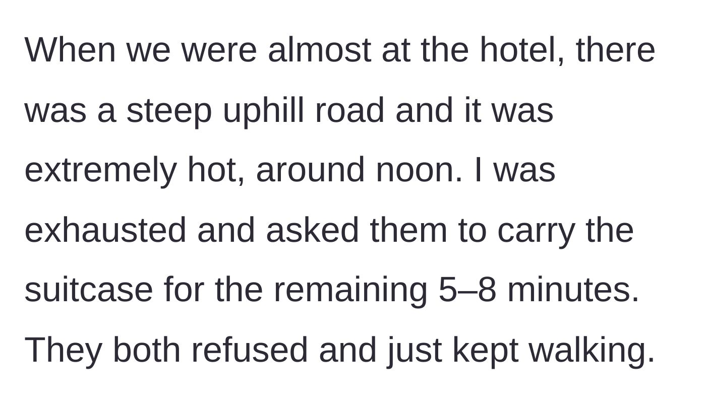 Story part 2 - Main character exhausted on a hot, steep hill asking her friends to take over the suitcase, while they refuse and walk away.