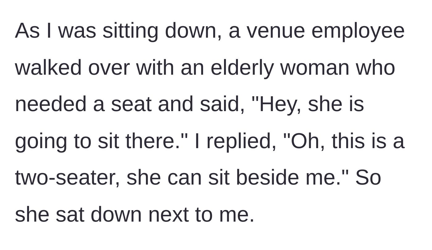 Story part 3 - A venue employee brings an elderly woman over, and she graciously shares the couch by letting her sit beside her.