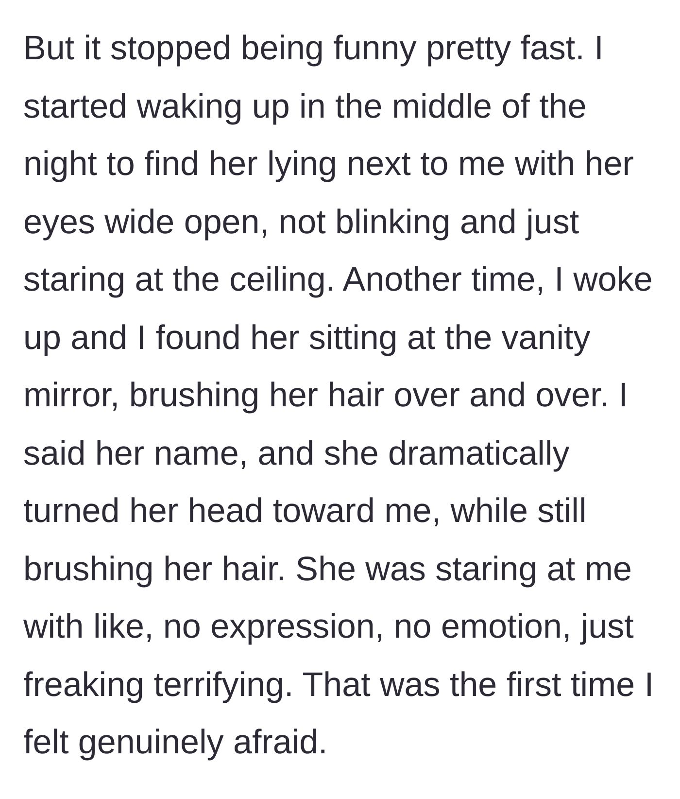 Story part 3 - Wife brushing her hair at the mirror with a blank expression.