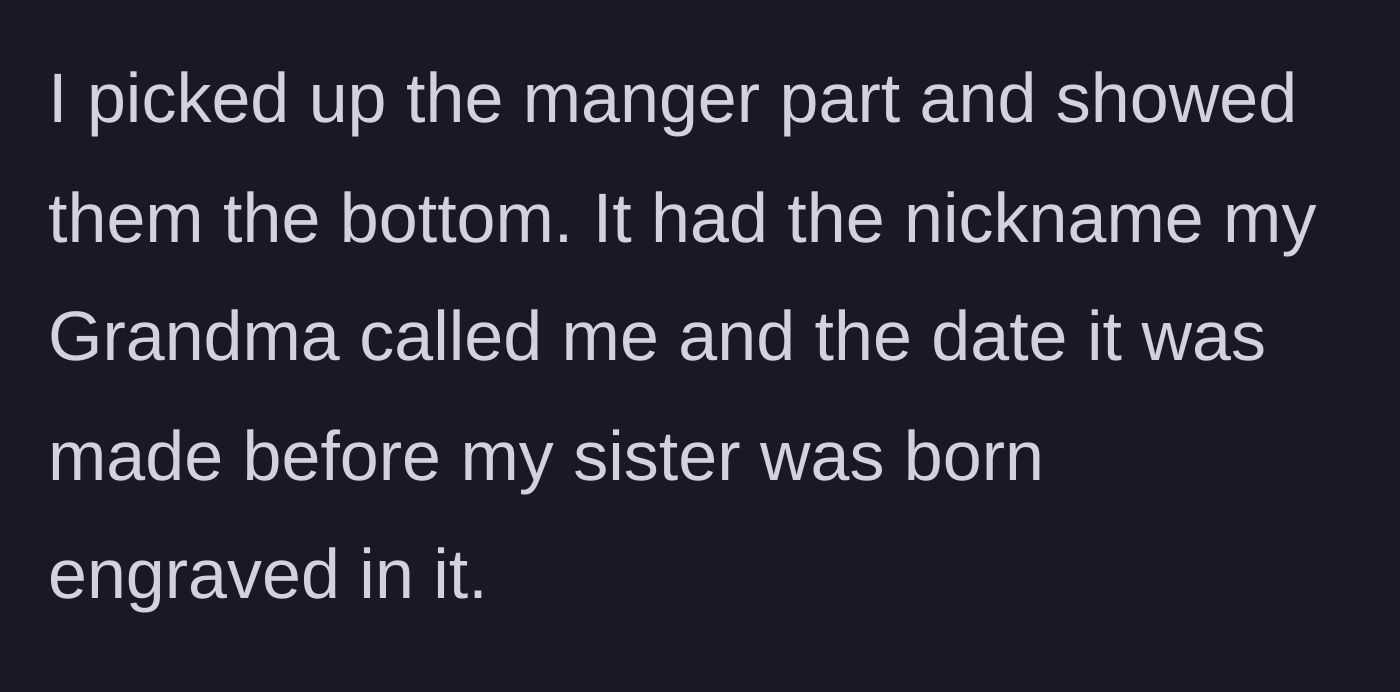 Story part 4 - The author flips the manger to reveal her nickname and the pre-sister date engraved by the grandmother.